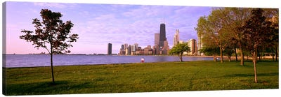 Trees in a park with lake and buildings in the background, Lincoln Park, Lake Michigan, Chicago, Illinois, USA Canvas Art Print - City Park Art