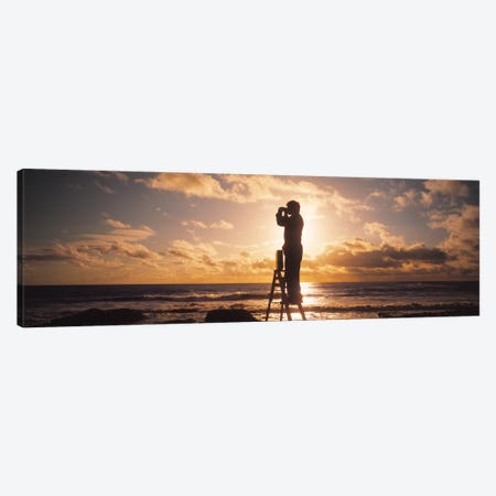 Man Looking Through Binoculars In Silhouette Canvas Print #PIM4145} by Panoramic Images Art Print