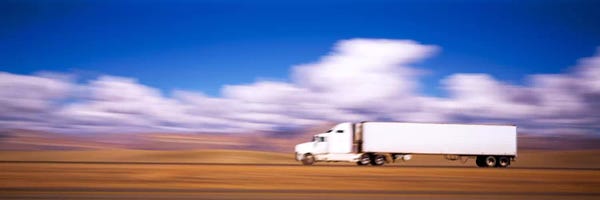 Blurred Motion View Of A Semi Truck, Interstate 70, Near Green River, Utah, USA