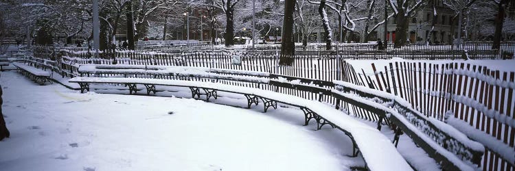 Snowcapped benches in a park, Washington Square Park, Manhattan, New York City, New York State, USA