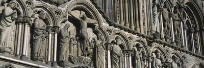 Low angle view of statues carved on wall of a cathedralTrondheim, Norway by Panoramic Images canvas print