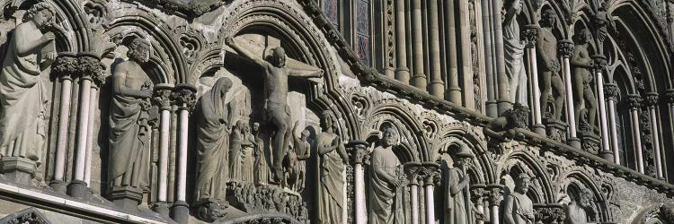 Low angle view of statues carved on wall of a cathedralTrondheim, Norway