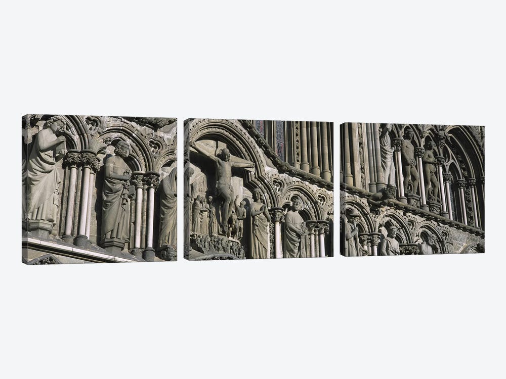 Low angle view of statues carved on wall of a cathedralTrondheim, Norway by Panoramic Images 3-piece Art Print