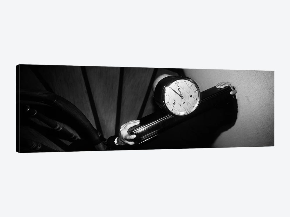 Man Carrying Clock Up Stairs on Shoulders by Panoramic Images 1-piece Canvas Wall Art