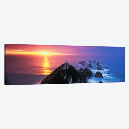 SunsetNugget Point Lighthouse, South Island, New Zealand Canvas Print #PIM4310} by Panoramic Images Canvas Art Print