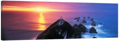 SunsetNugget Point Lighthouse, South Island, New Zealand Canvas Art Print - Rock Art