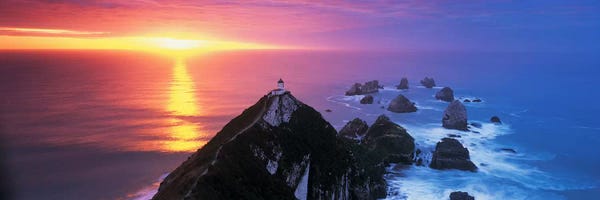 Rocks: SunsetNugget Point Lighthouse, South Island, New Zealand by Panoramic Images