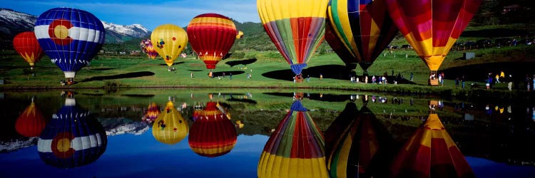 Reflection of hot air balloons in a lake, Snowmass Village, Pitkin County, Colorado, USA by Panoramic Images wall art