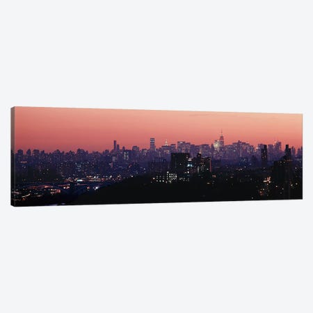 High angle view of buildings lit up at duskManhattan, New York City, New York State, USA Canvas Print #PIM4328} by Panoramic Images Canvas Wall Art