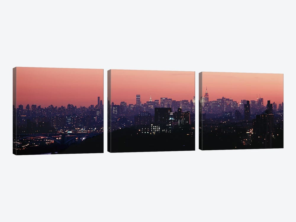 High angle view of buildings lit up at duskManhattan, New York City, New York State, USA by Panoramic Images 3-piece Canvas Artwork