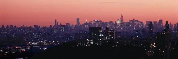 New York City Skylines: High angle view of buildings lit up at duskManhattan, New York City, New York State, USA by Panoramic Images