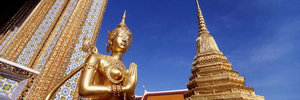 Thailand: Low angle view of a statueWat Phra Kaeo, Grand Palace, Bangkok, Thailand by Panoramic Images