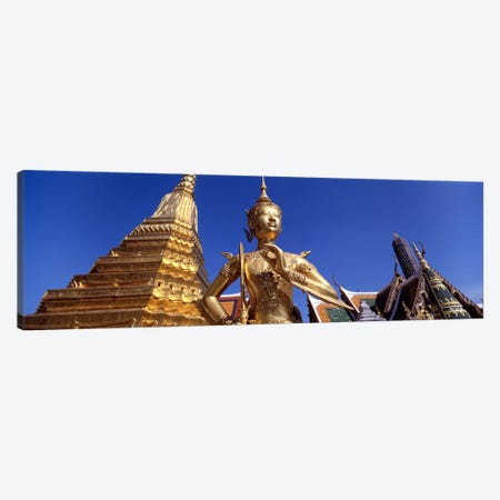 Low angle view of a statueWat Phra Kaeo, Grand Palace, Bangkok, Thailand Canvas Print #PIM4343} by Panoramic Images Canvas Wall Art