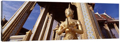Low angle view of a statueWat Phra Kaeo, Grand Palace, Bangkok, Thailand Canvas Art Print - The Grand Palace