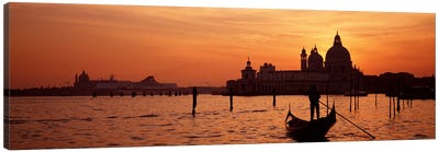 Santa Maria della Salute With A Gondoleer And His Boat On The Grand Canal In The Foreground, Venice, Italy Canvas Art Print - Dome Art