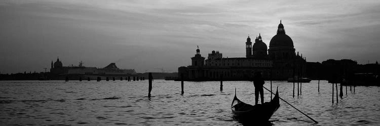 Santa Maria della Salute In B&W With A Gondoleer And His Boat On The Grand Canal In The Foreground, Venice, Italy