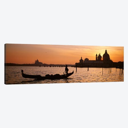 Silhouette of a gondola in a canal at sunset, Santa Maria Della Salute, Venice, Italy Canvas Print #PIM4361} by Panoramic Images Canvas Art