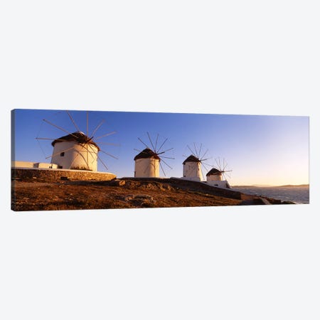 Low angle view of traditional windmills, Mykonos, Cyclades Islands, Greece Canvas Print #PIM4444} by Panoramic Images Canvas Art