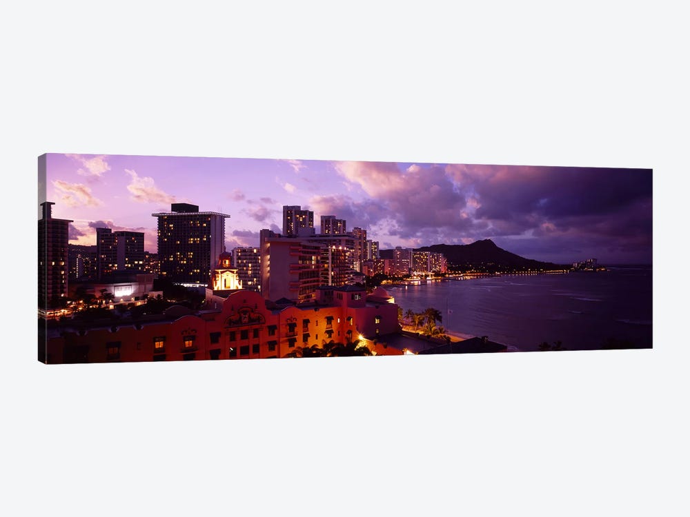 Buildings lit up at dusk, Waikiki, Oahu, Hawaii, USA by Panoramic Images 1-piece Canvas Artwork