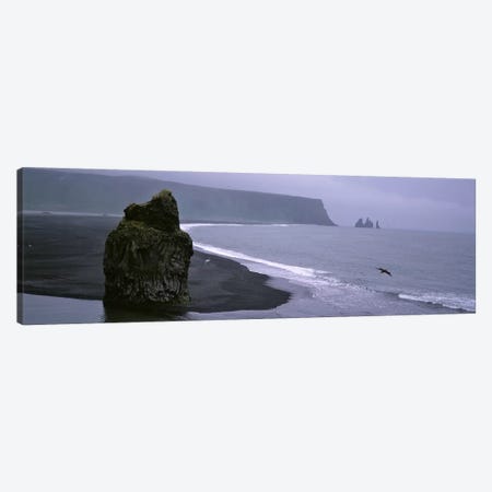 Distant View Of Reynisdrangar From Kirkjufjara Beach, Iceland Canvas Print #PIM4534} by Panoramic Images Canvas Artwork