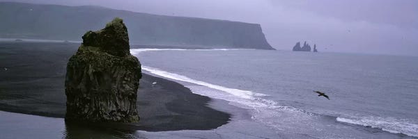 Iceland: Distant View Of Reynisdrangar From Kirkjufjara Beach, Iceland by Panoramic Images
