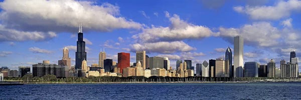 Illinois: USA, Illinois, Chicago, Panoramic view of an urban skyline by the shore by Panoramic Images