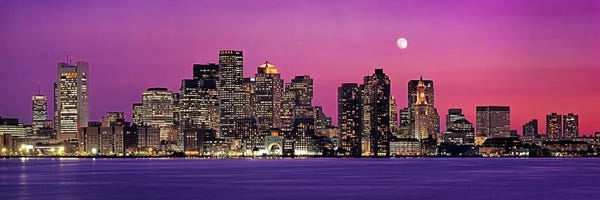 City Sunrises & Sunsets: USA, Massachusetts, Boston, View of an urban skyline by the shore at night by Panoramic Images