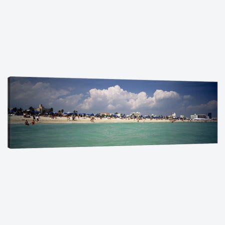 Tourists on the beach, Miami, Florida, USA Canvas Print #PIM4595} by Panoramic Images Canvas Art