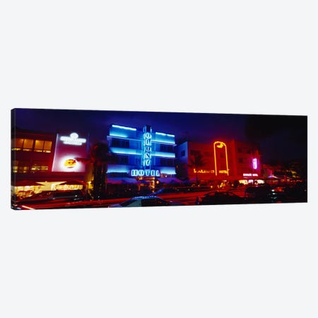 Low Angle View Of A Hotel Lit Up At Night, Miami, Florida, USA Canvas Print #PIM4596} by Panoramic Images Canvas Wall Art