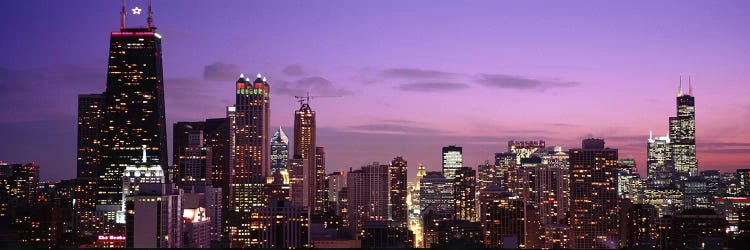 Buildings lit up at dusk, Chicago, Illinois, USA