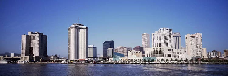 Buildings at the waterfront, Mississippi River, New Orleans, Louisiana, USA by Panoramic Images wall art