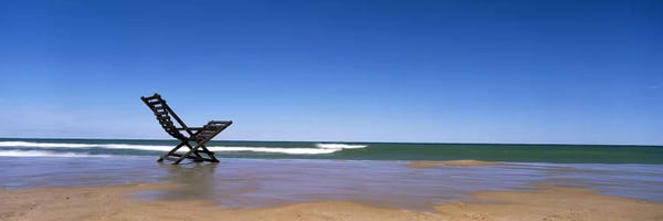 Royal Blue: Empty Chair On A Beach, Grand Haven, Ottawa County, Michigan, USA by Panoramic Images