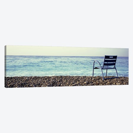 Vacant Chair On The Beach, Nice, Cote De Azur, France Canvas Print #PIM4671} by Panoramic Images Canvas Art