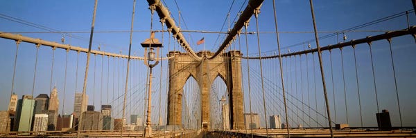 Brooklyn Bridge: USA, New York State, New York City, Brooklyn Bridge at dawn by Panoramic Images