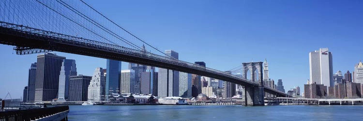 USA, New York State, New York City, Brooklyn Bridge, Skyscrapers in a city by Panoramic Images wall art