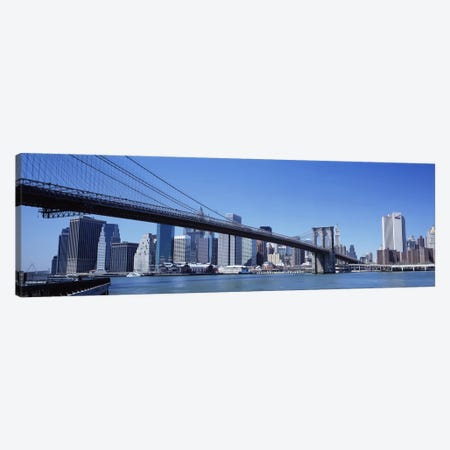 USA, New York State, New York City, Brooklyn Bridge, Skyscrapers in a city Canvas Print #PIM4678} by Panoramic Images Canvas Artwork