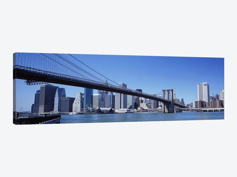 USA, New York State, New York City, Brooklyn Bridge, Skyscrapers in a city by Panoramic Images 1-piece Art Print