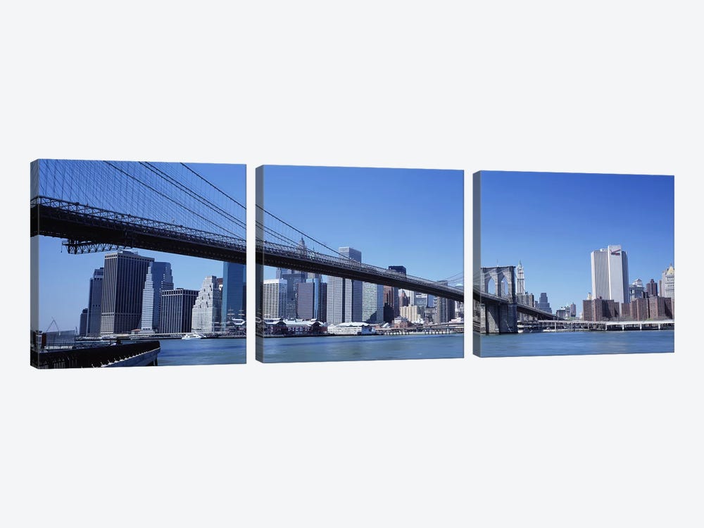USA, New York State, New York City, Brooklyn Bridge, Skyscrapers in a city by Panoramic Images 3-piece Art Print