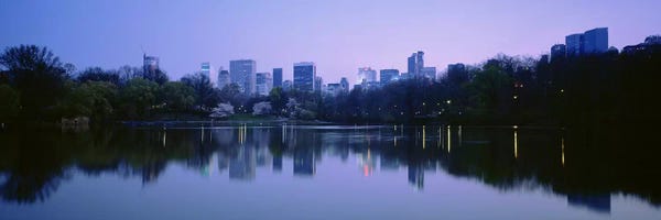 Central Park: USANew York State, New York City, Central Park Lake, Skyscrapers in a city by Panoramic Images