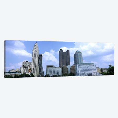 USA, Ohio, Columbus, Clouds over tall building structures Canvas Print #PIM4688} by Panoramic Images Art Print