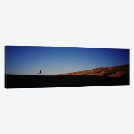 USA, Colorado, Great Sand Dunes National Monument, Runner jogging in the park Canvas Print #PIM4702} by Panoramic Images Canvas Wall Art
