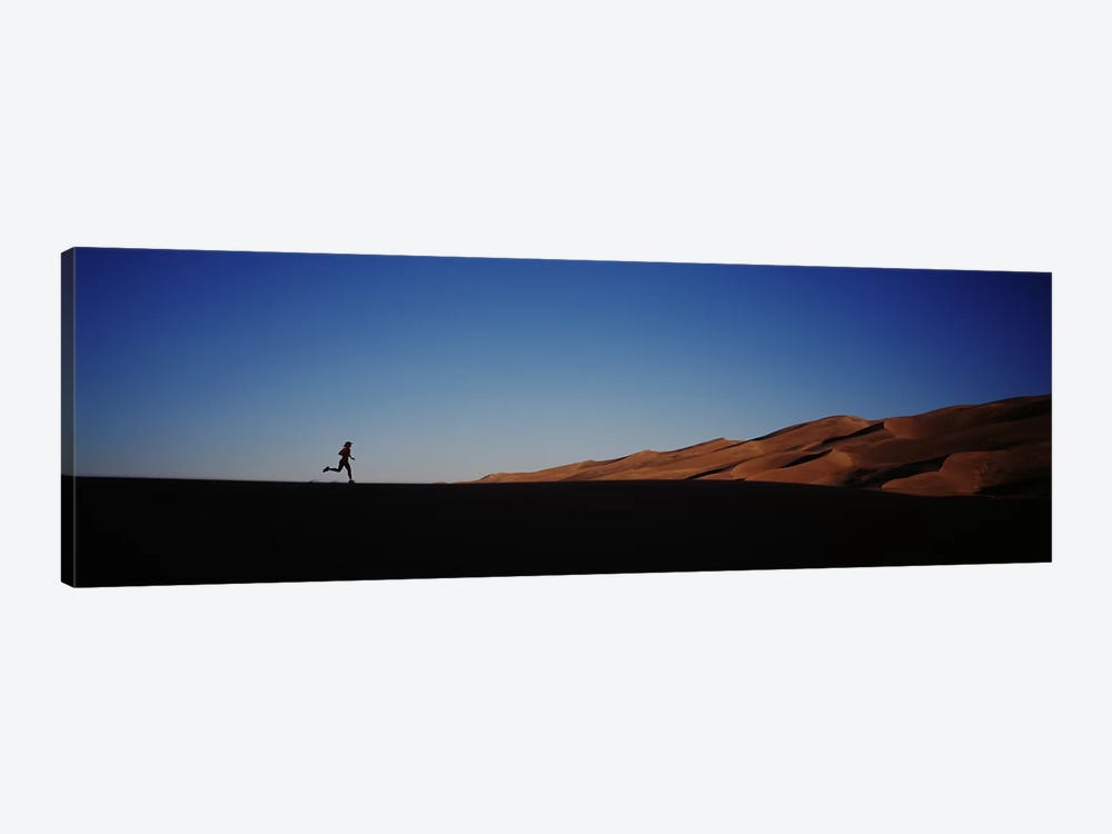 USA, Colorado, Great Sand Dunes National Monument, Runner jogging in the park by Panoramic Images 1-piece Canvas Print