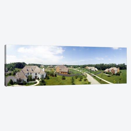 High angle view of houses on a field Canvas Print #PIM4747} by Panoramic Images Art Print