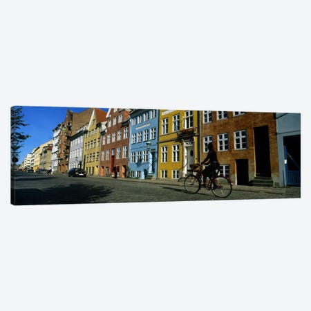 Woman Riding A Bicycle, Copenhagen, Denmark Canvas Print #PIM4764} by Panoramic Images Art Print