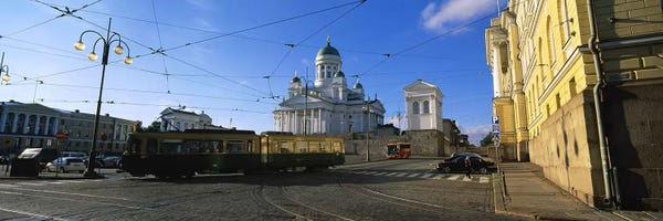 Blue Domed Church Santorini: Tram Moving On A Road, Senate Square, Helsinki, Finland by Panoramic Images