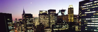 Buildings lit up at dusk, Manhattan, New York City, New York State, USA by Panoramic Images canvas print