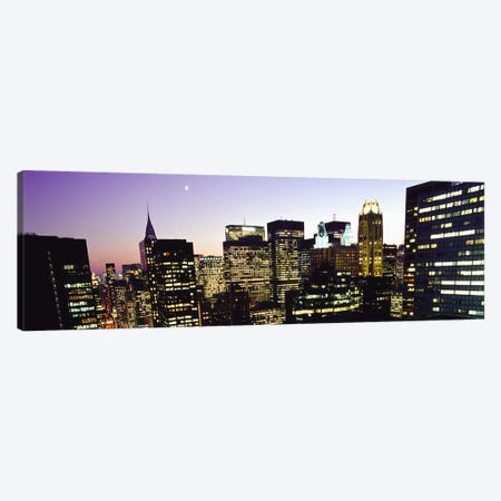 Buildings lit up at dusk, Manhattan, New York City, New York State, USA Canvas Print #PIM4826} by Panoramic Images Canvas Art