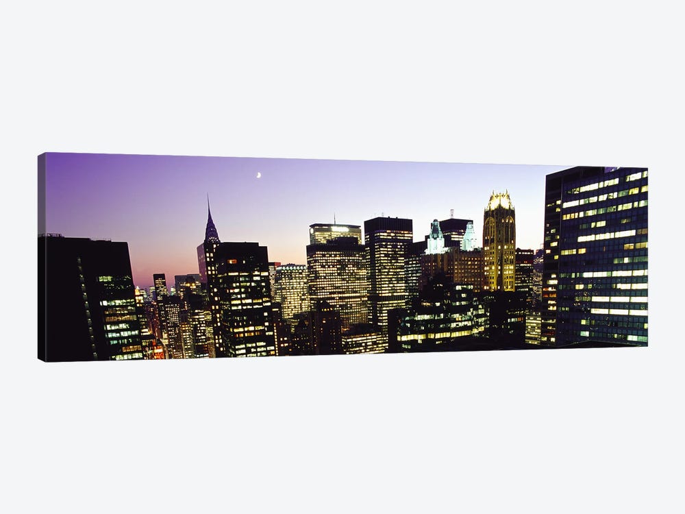 Buildings lit up at dusk, Manhattan, New York City, New York State, USA by Panoramic Images 1-piece Art Print