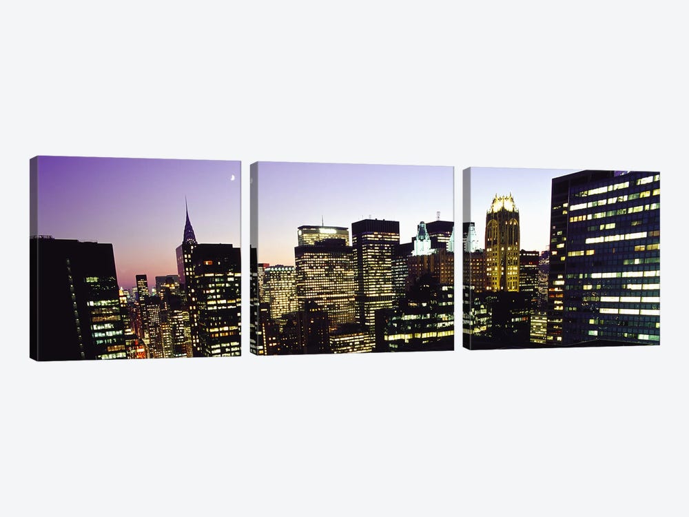 Buildings lit up at dusk, Manhattan, New York City, New York State, USA by Panoramic Images 3-piece Art Print
