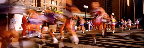 Track & Field: Blurred Motion Of Marathon Runners, Houston, Texas, USA by Panoramic Images